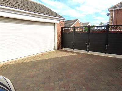 DETACHED BRICK BUILT DOUBLE GARAGE
